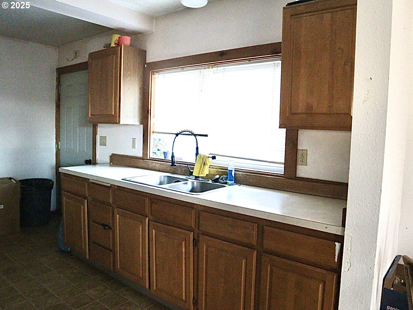 59720 Highway 26 John Day, OR 97845 - Photo 12 of 22 a bathroom with a double vanity sink and a mirror