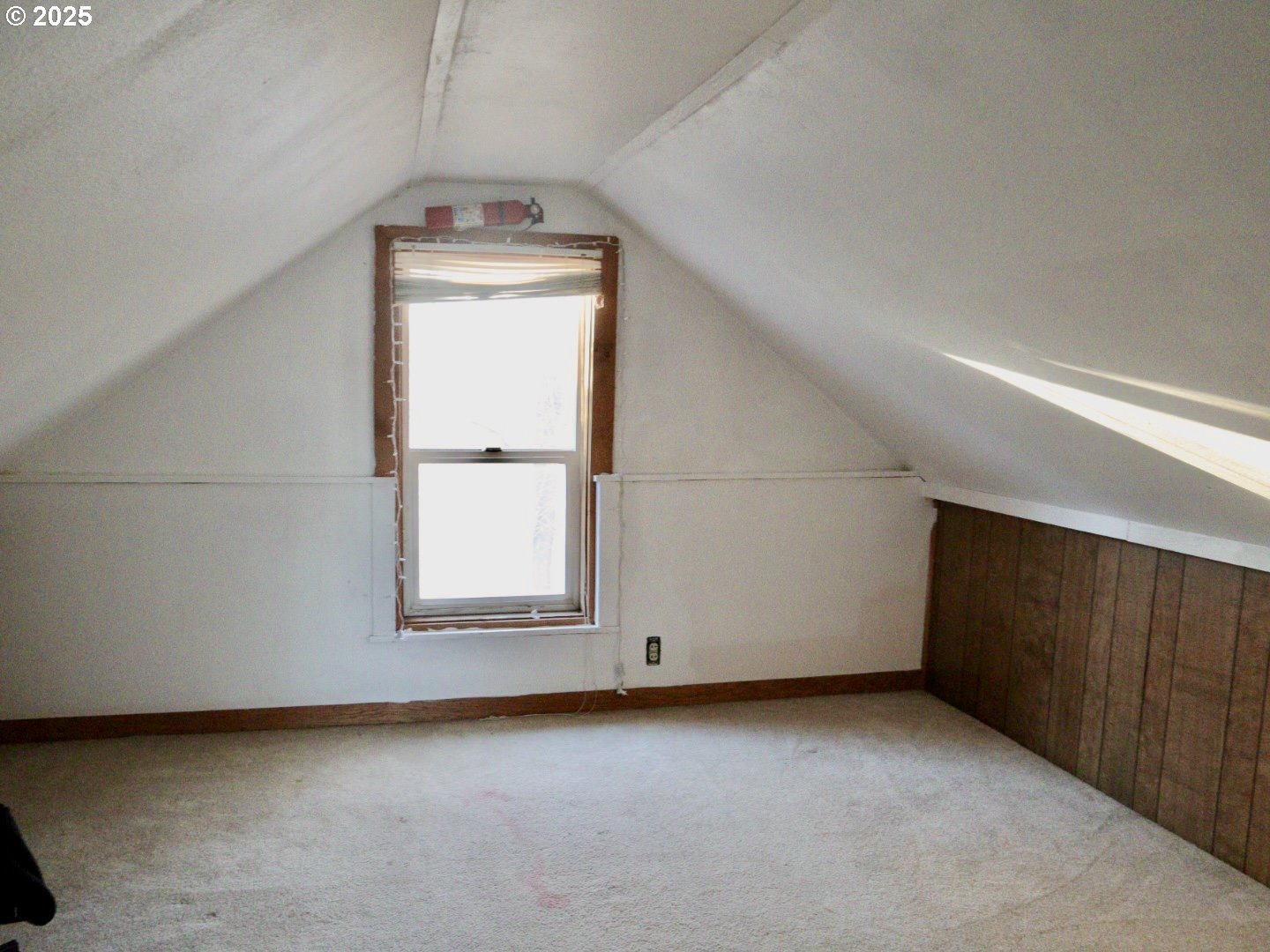 59720 Highway 26 John Day, OR 97845 - Photo 14 of 22 an empty room with wooden floor and windows