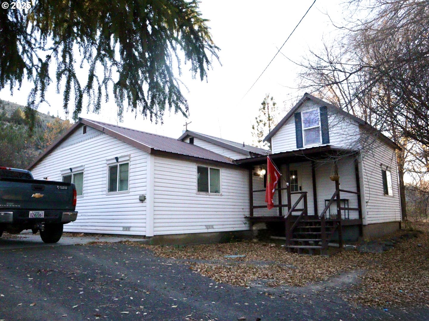59720 Highway 26 John Day, OR 97845 - Photo 8 of 22 a view of a house with a yard and tree