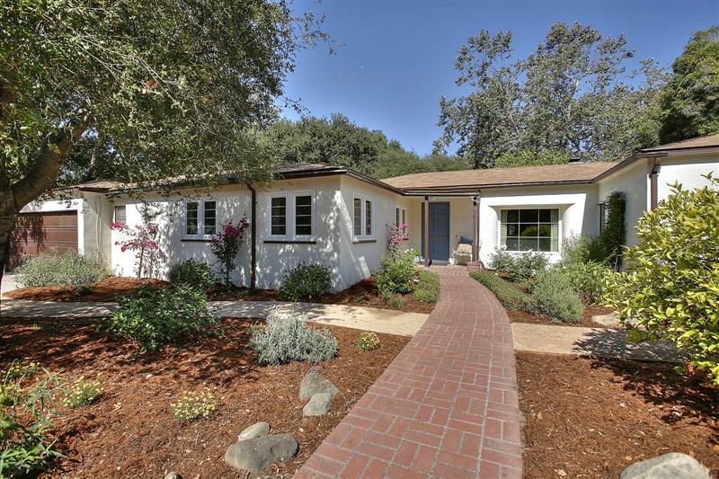 326 Canon Drive Santa Barbara, CA 93105 - Photo 1 of 16 a front view of a house with yard and green space