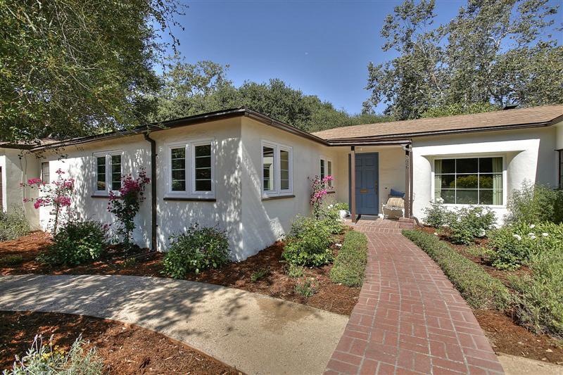 326 Canon Drive Santa Barbara, CA 93105 - Photo 2 of 16 a front view of a house with a yard and potted plants