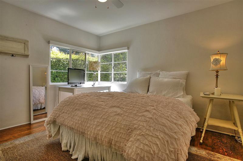 326 Canon Drive Santa Barbara, CA 93105 - Photo 9 of 16 a bed sitting in a bedroom next to a window