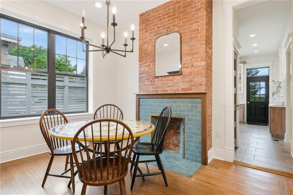 4749 Wallingford Street Pittsburgh, PA 15213 - Photo 13 of 49 a view of a dining room with furniture window and wooden floor