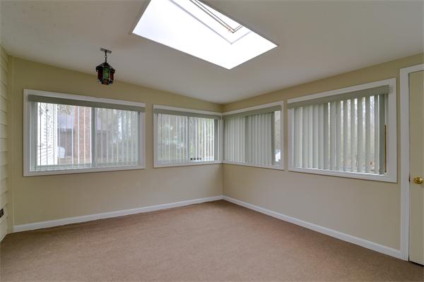 22 Stratford Road Natick, MA 01760 - Photo 6 of 18 a view of an empty room with a window