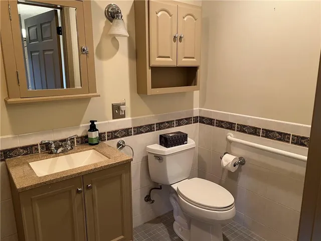 a bathroom with a sink and a toilet
