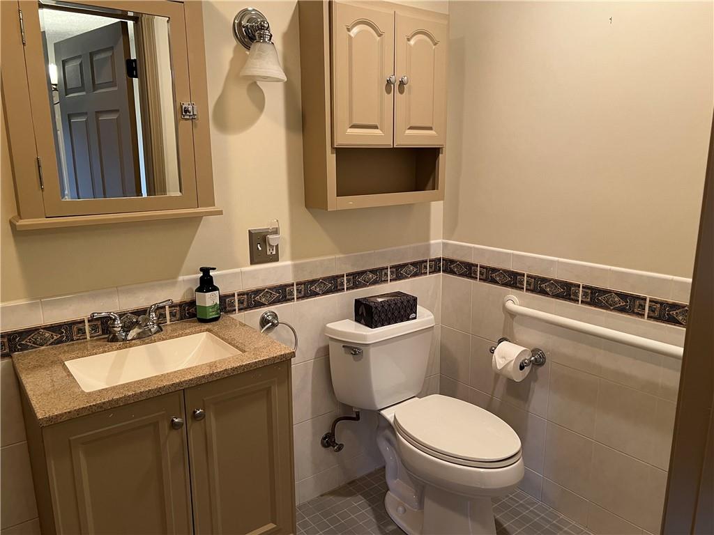 2902 Darlington Road, Unit 1002 Beaver Falls, PA 15010 - Photo 13 of 27 a bathroom with a sink and a toilet