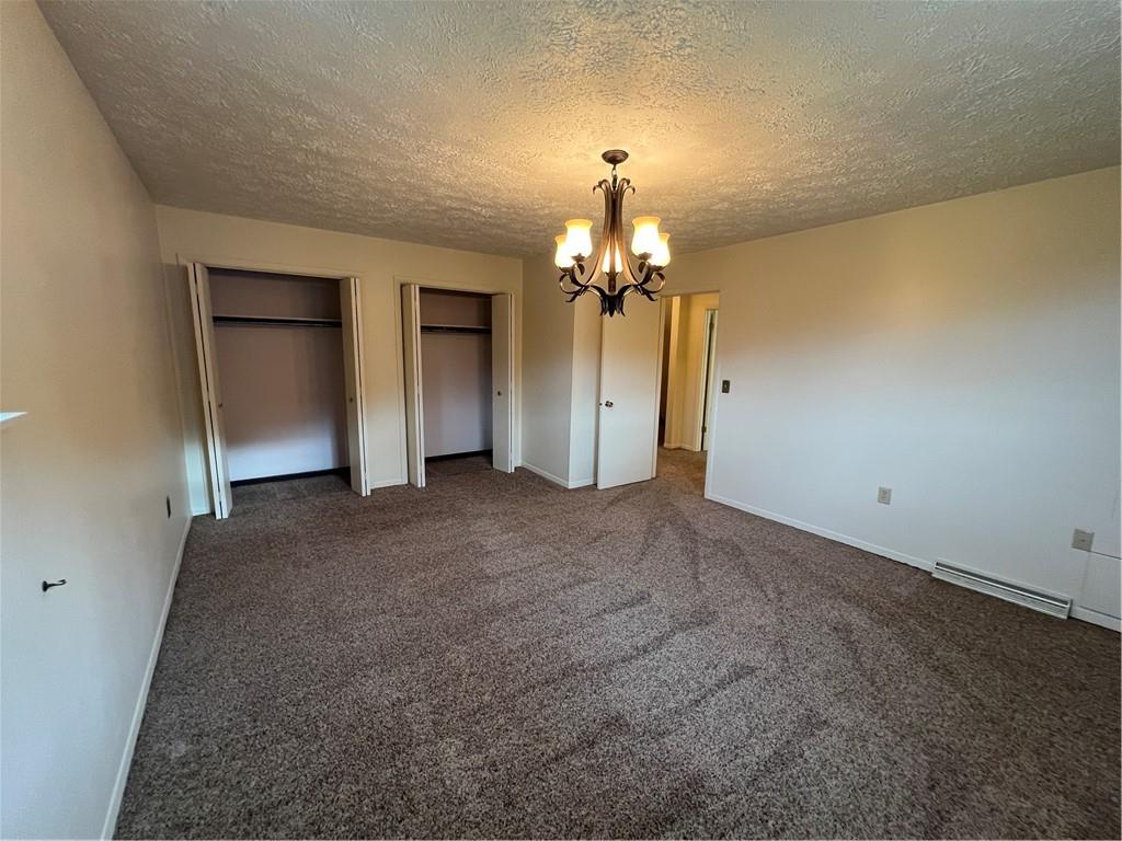 2902 Darlington Road, Unit 1002 Beaver Falls, PA 15010 - Photo 15 of 27 wooden floor in an empty room