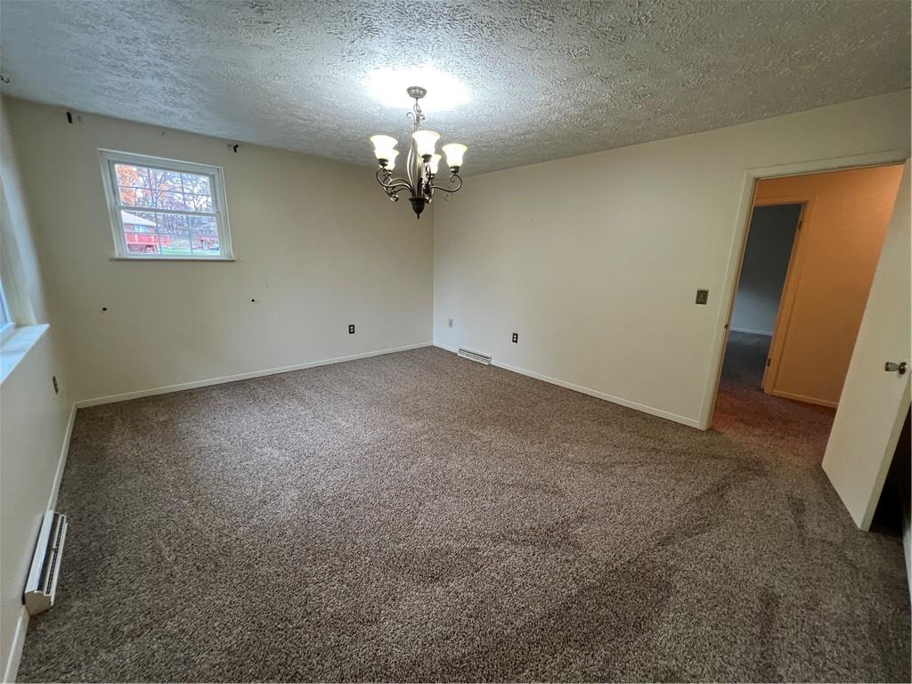2902 Darlington Road, Unit 1002 Beaver Falls, PA 15010 - Photo 18 of 27 an empty room with a mirror