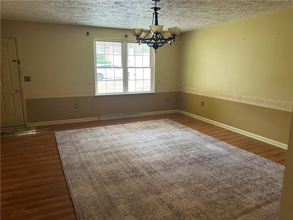 2902 Darlington Road, Unit 1002 Beaver Falls, PA 15010 - Photo 6 of 27 a view of empty room with wooden floor and fan