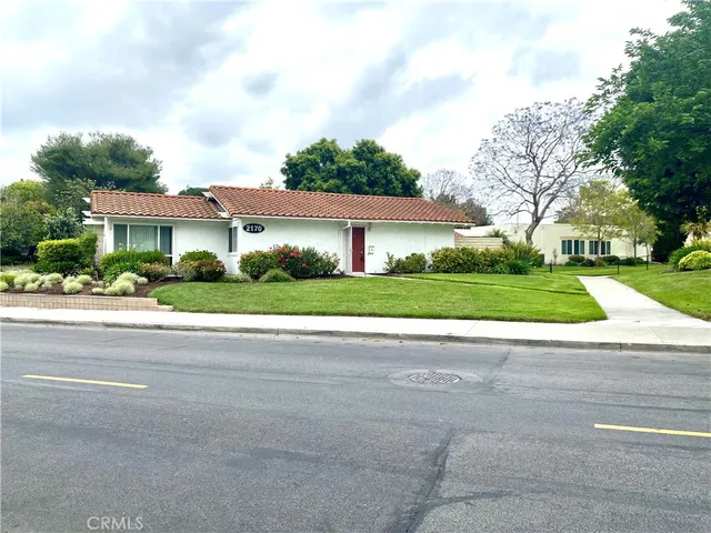 a view of road with house in background