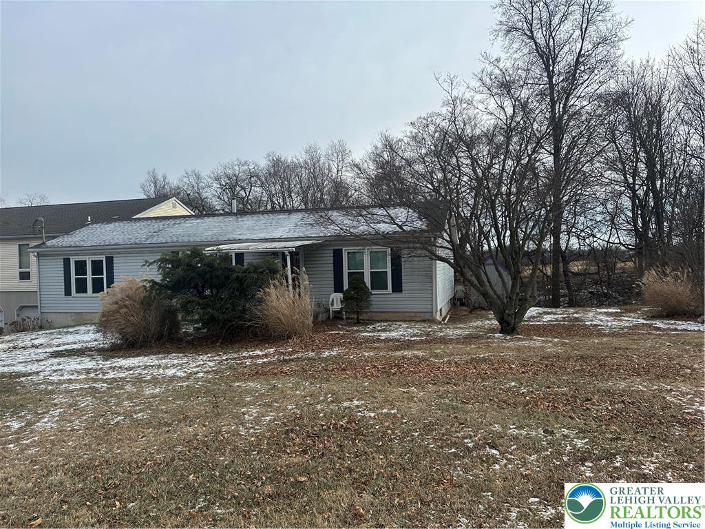 1157 Blue Barn Road Allentown, PA 18104 - Photo 22 of 23 a view of a house with a yard