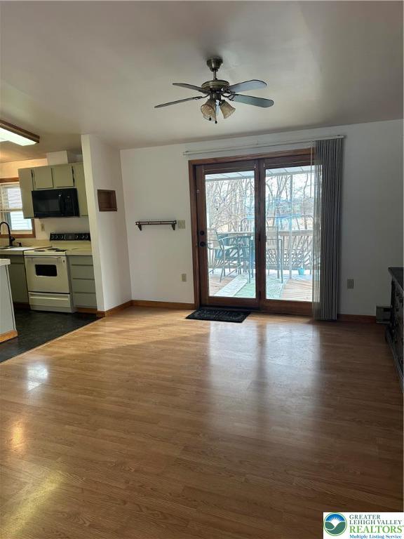 1157 Blue Barn Road Allentown, PA 18104 - Photo 5 of 23 wooden floor in an empty room with a window