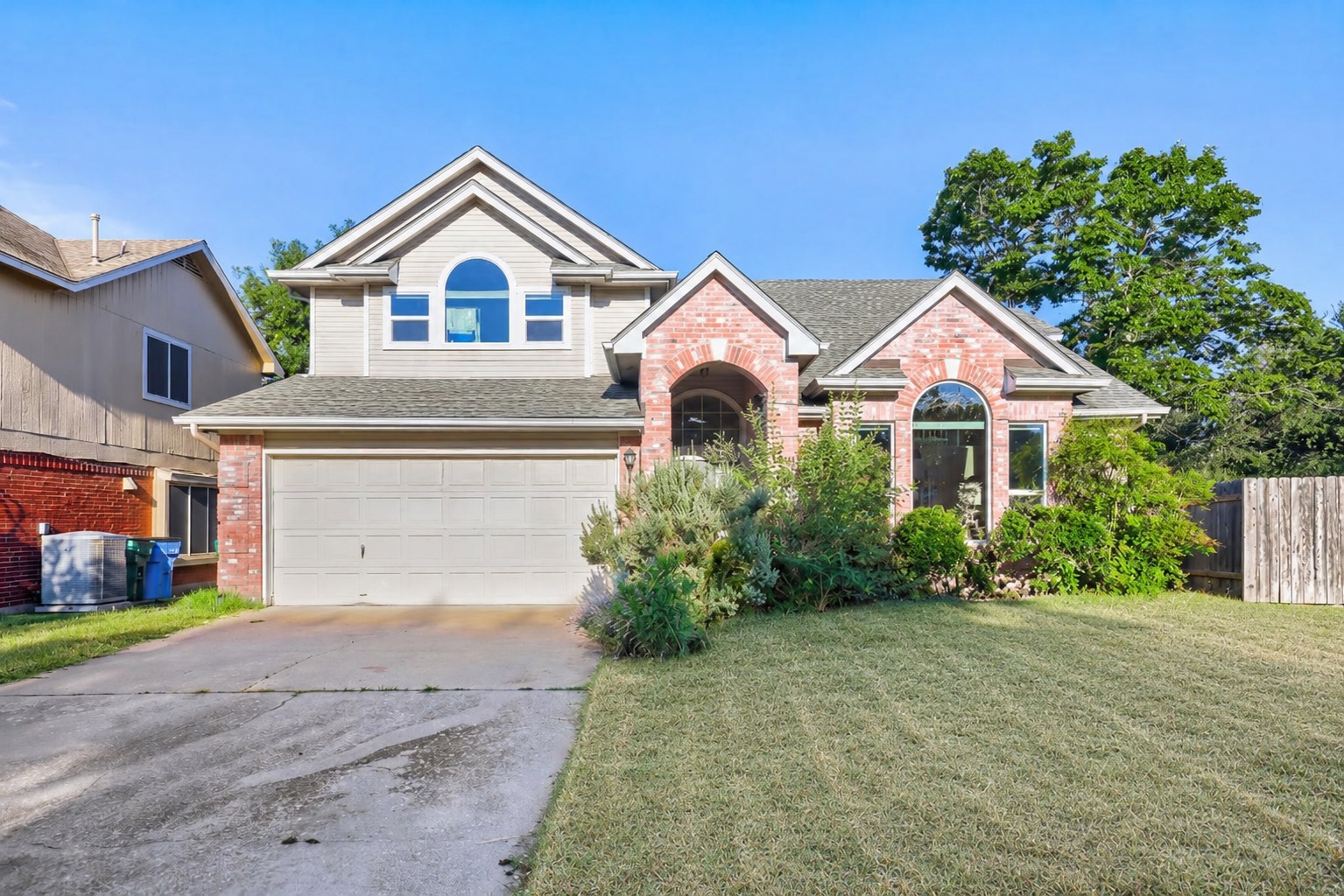 17204 Village Glen Road Pflugerville, TX 78660 - Photo 1 of 19 Yard modified with AI to show lawn mowed; owners have lawn scheduled to be mowed twice weekly during listing period.