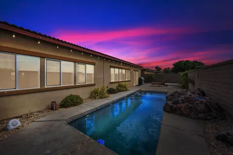 a swimming pool with yard