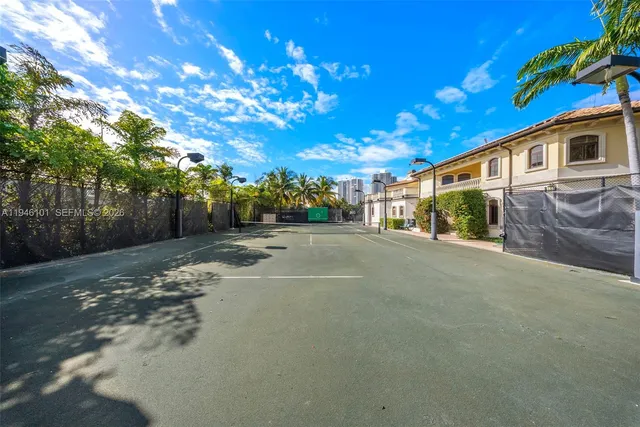 a bathroom with a granite countertop sink toilet a mirror a vanity and shower