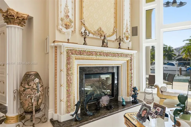 an aerial view of a house with outdoor space pool seating area and fire pit