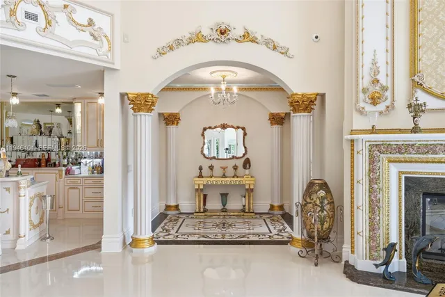 a view of a house with swimming pool and a yard