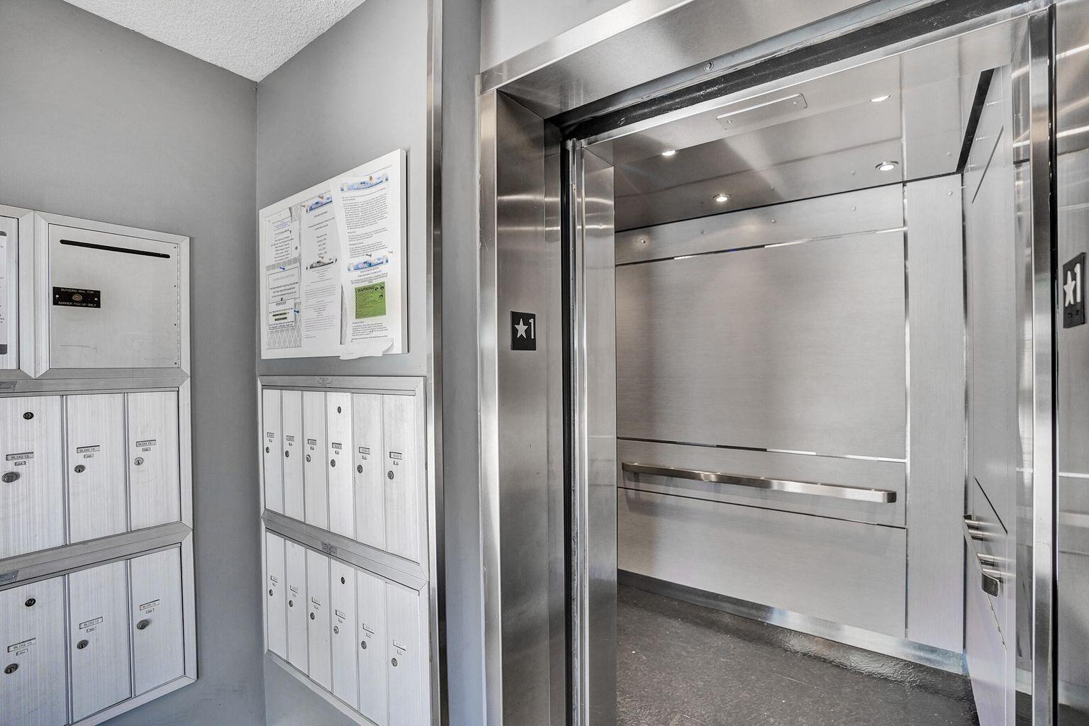 6193 Balboa Circle, Unit 201 Boca Raton, FL 33433 - Photo 51 of 62 a bathroom with a glass shower door
