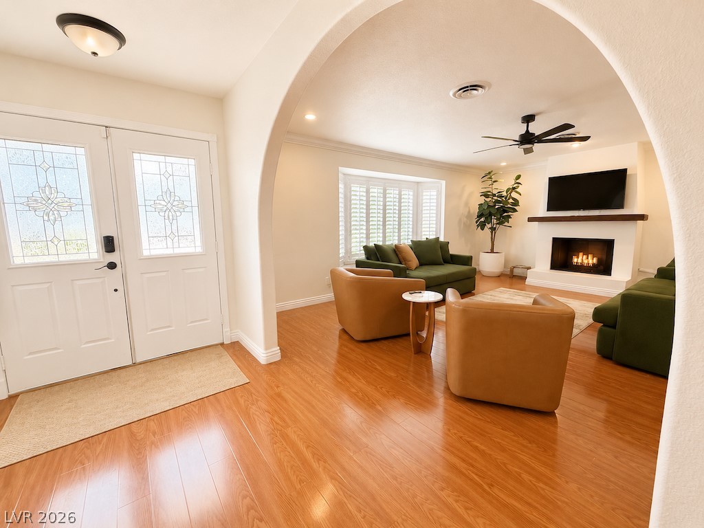 3010 East Viking Road Las Vegas, NV 89121 - Photo 7 of 48 Step inside to gleaming hardwood floors and an inviting fireplace in this well-appointed living area.