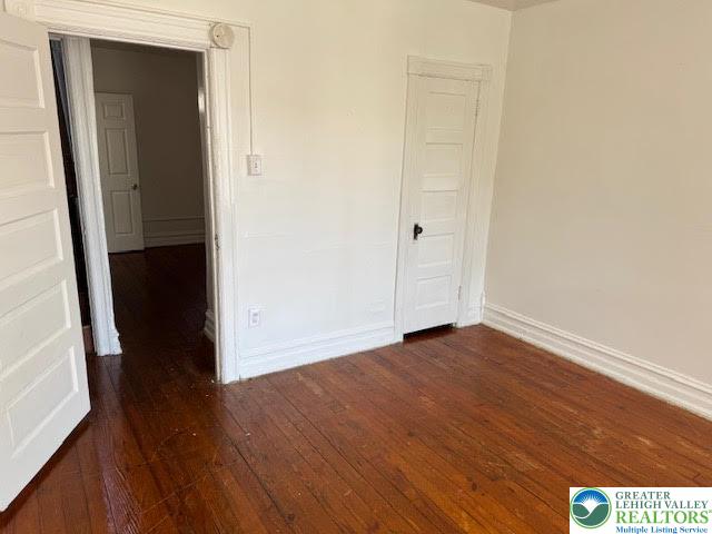 208 Ridge Avenue Allentown, PA 18102 - Photo 11 of 17 an empty room with wooden floor and closet