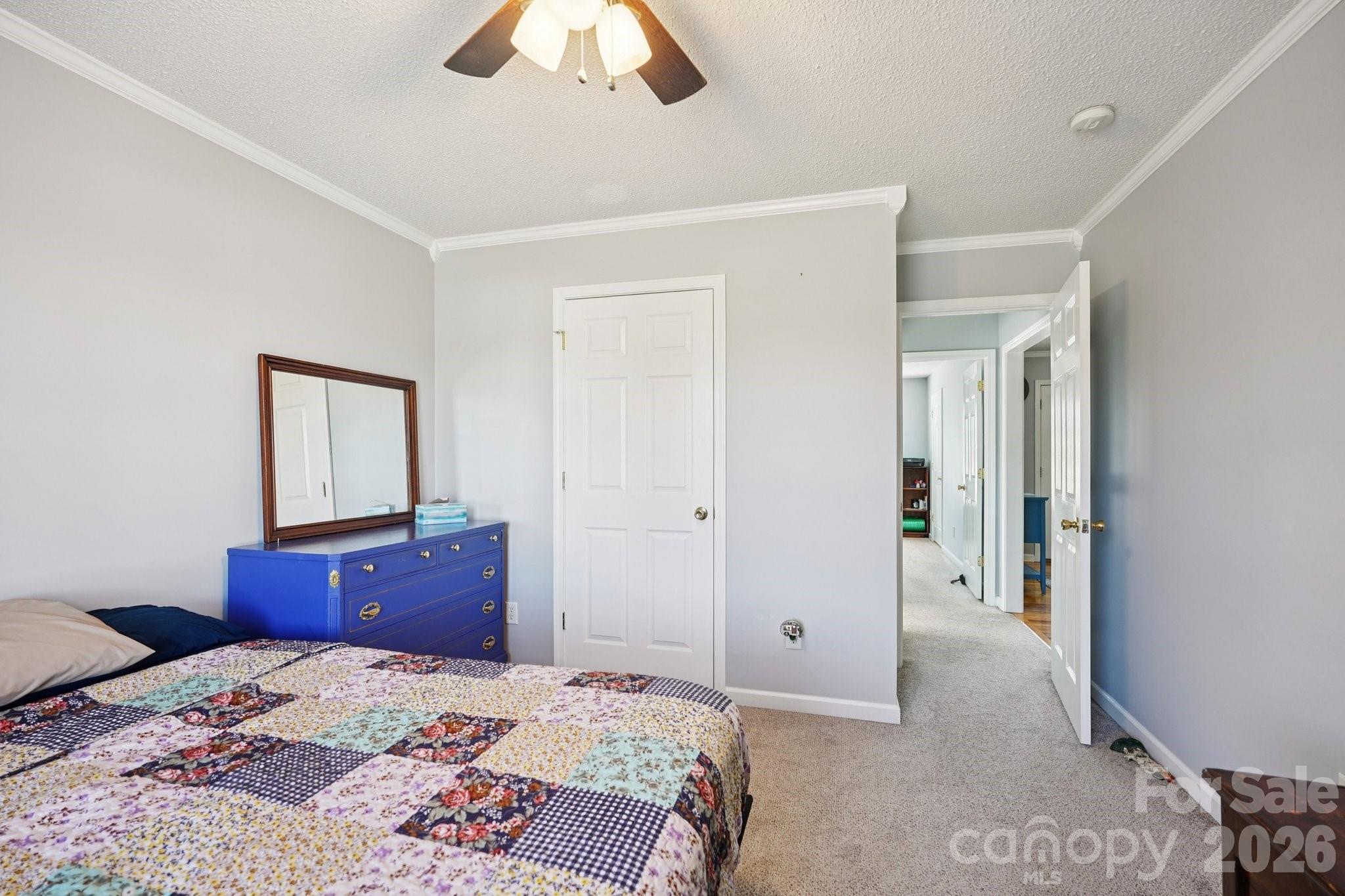 3802 Babe Lane Vale, NC 28168 - Photo 13 of 27 a bedroom with a bed and a dresser