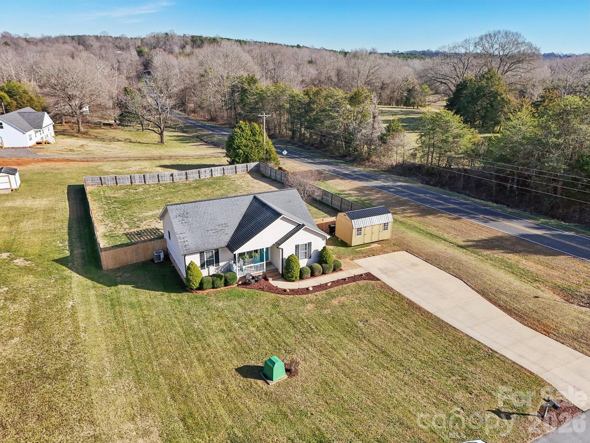 3802 Babe Lane Vale, NC 28168 - Photo 19 of 27 a view of a swimming pool with an outdoor seating