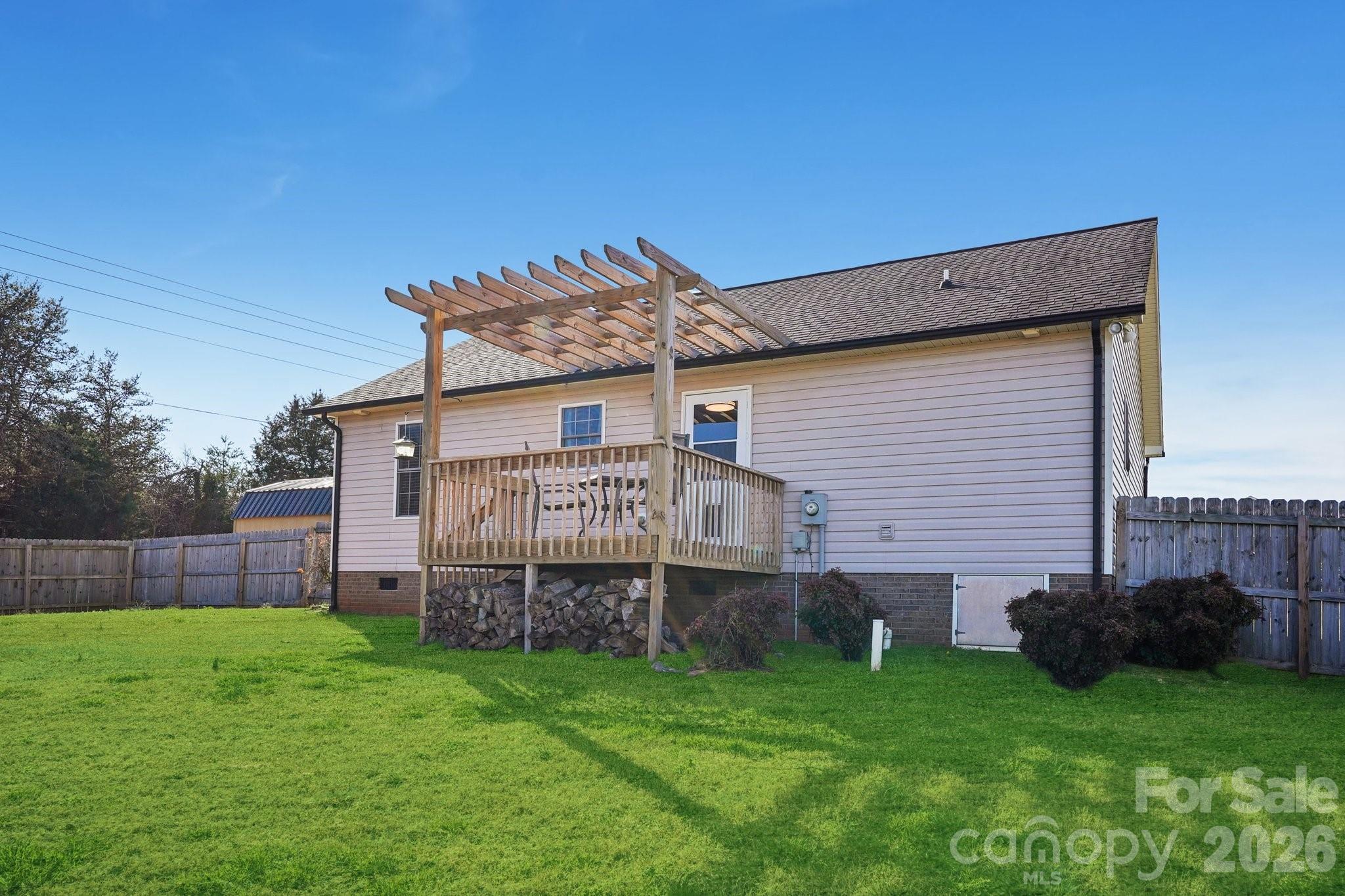3802 Babe Lane Vale, NC 28168 - Photo 27 of 27 a view of a back yard of the house and front view of a house