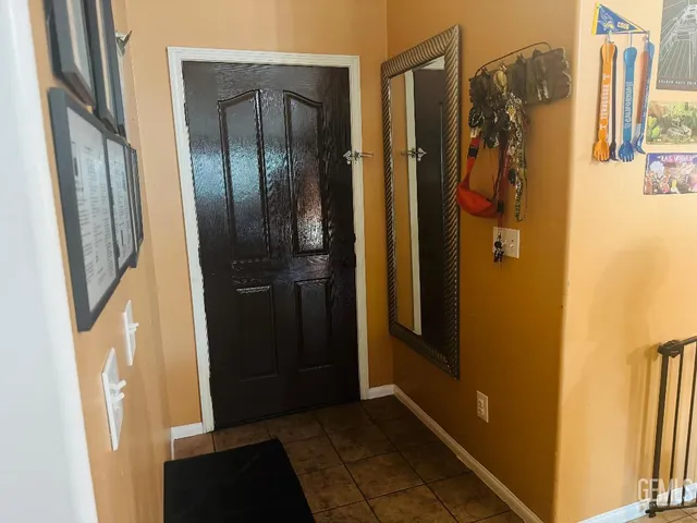 a view of a bathroom from a hallway