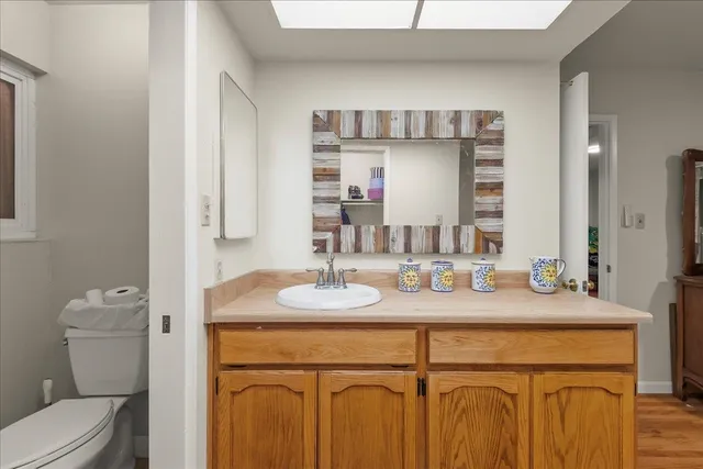 a workspace with furniture and wooden floor