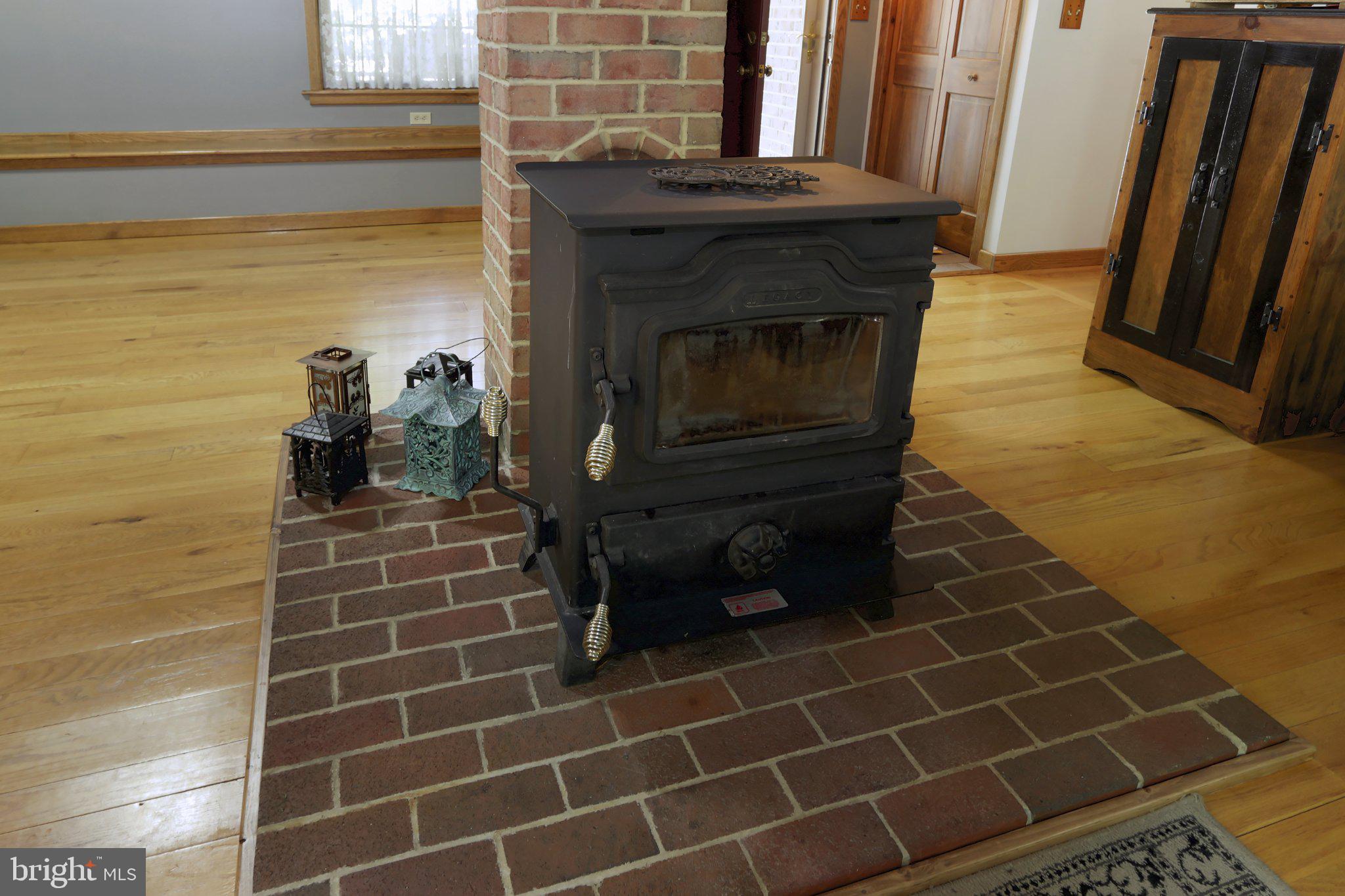 1580 Girl Scout Road Denver, PA 17517 - Photo 20 of 47 Bright and open living area with coal stove