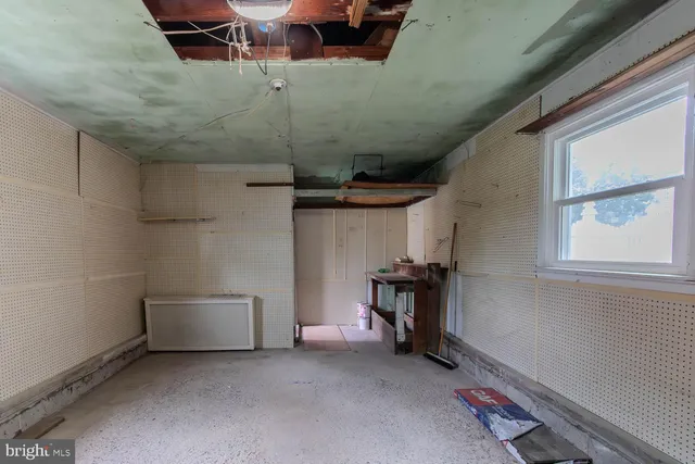 a view of front door and yard