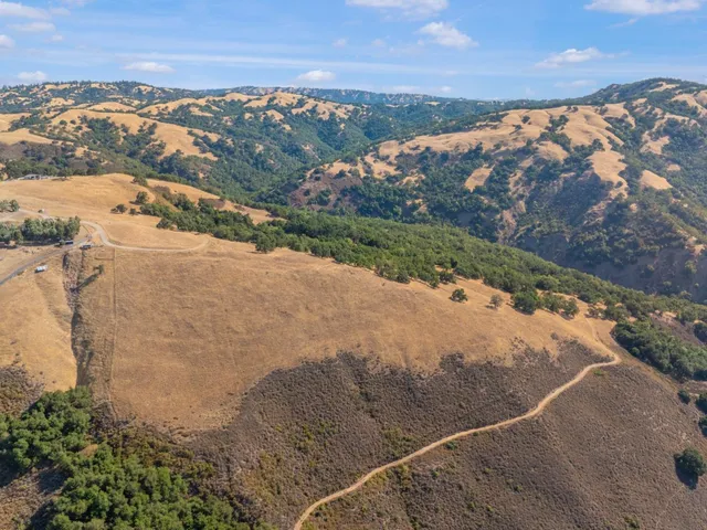 an aerial view of a highlighted house