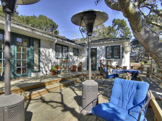 25064 Hatton Road Carmel, CA 93923 - Photo 18 of 25 a view of a chairs and table in patio with a fire pit
