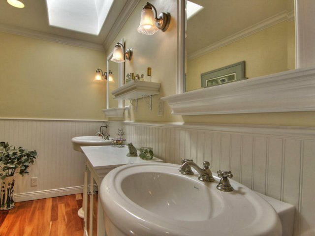 25064 Hatton Road Carmel, CA 93923 - Photo 19 of 25 a bathroom with a sink and a mirror