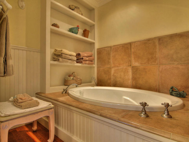 25064 Hatton Road Carmel, CA 93923 - Photo 20 of 25 a bathroom with a sink and a mirror
