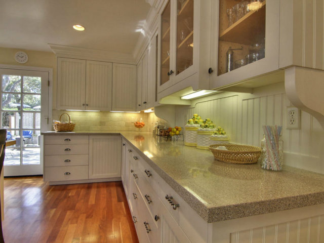 25064 Hatton Road Carmel, CA 93923 - Photo 2 of 25 a kitchen with counter top space and cabinets