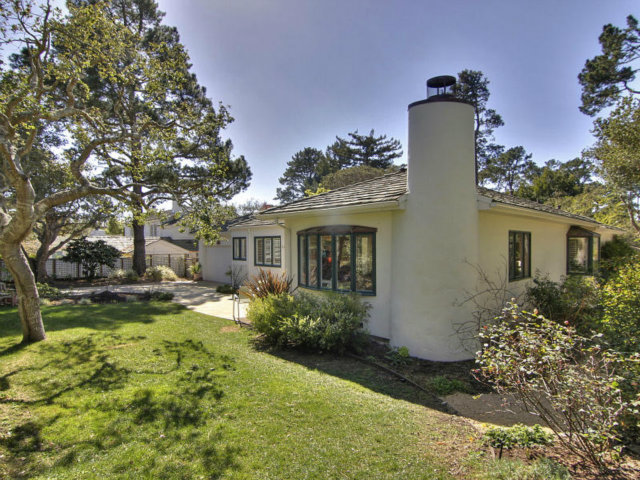 25064 Hatton Road Carmel, CA 93923 - Photo 23 of 25 a front view of a house with a yard