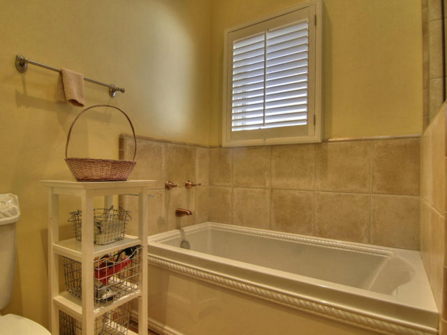 25064 Hatton Road Carmel, CA 93923 - Photo 24 of 25 a bathroom with a sink and a bathtub