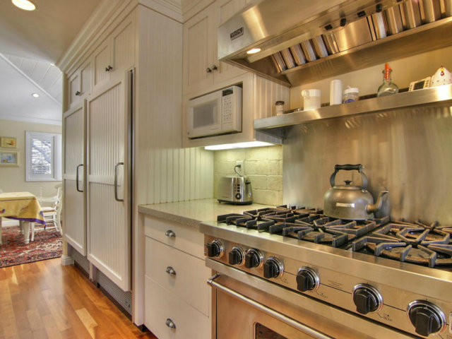 25064 Hatton Road Carmel, CA 93923 - Photo 3 of 25 a kitchen with stainless steel appliances granite countertop a stove and a refrigerator