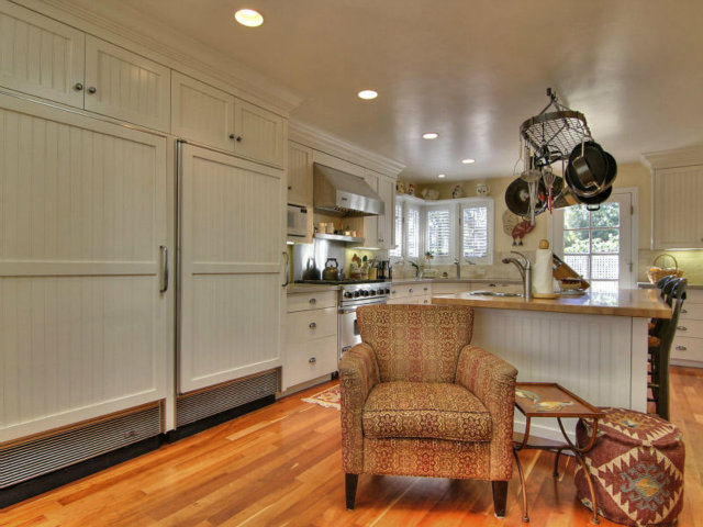 25064 Hatton Road Carmel, CA 93923 - Photo 9 of 25 a kitchen with stainless steel appliances granite countertop a refrigerator and a stove top oven