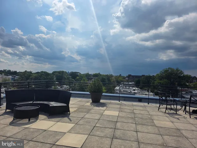 a view of a terrace with seating space