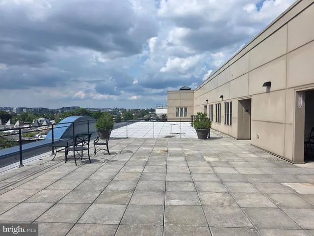 a view of a lake in middle of forest
