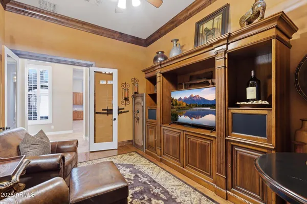 a bedroom with furniture and a window