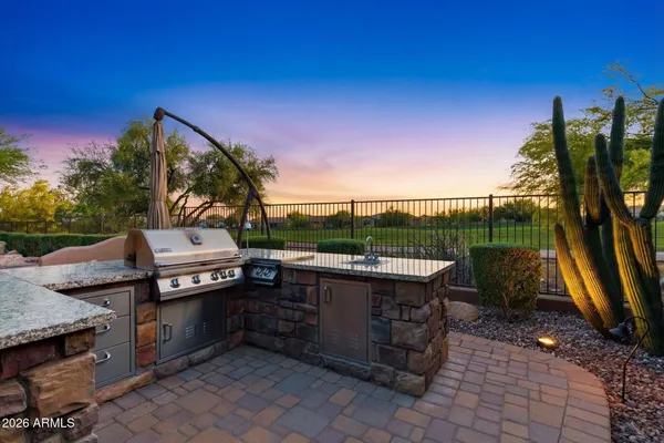 a view of a swimming pool with a sitting space and sitting area