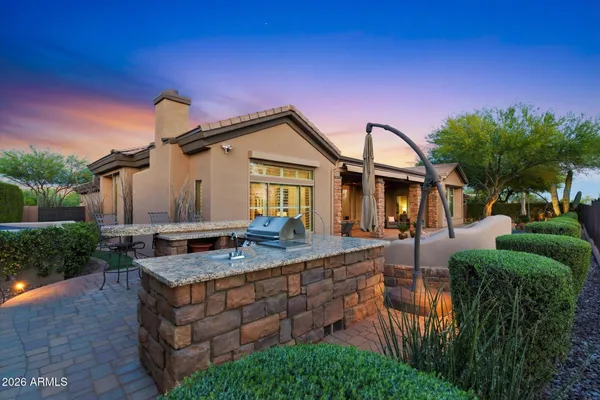 a view of swimming pool with outdoor seating