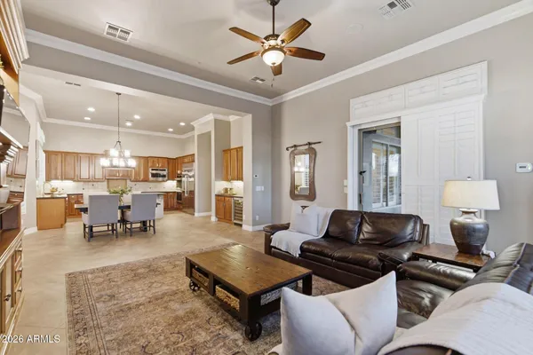 a living room with furniture and a table