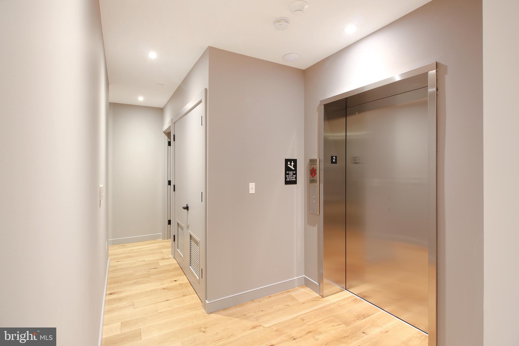 448 K Street Northwest, Unit 202 Washington, DC 20001 - Photo 6 of 25 a bathroom with a shower and a glass door