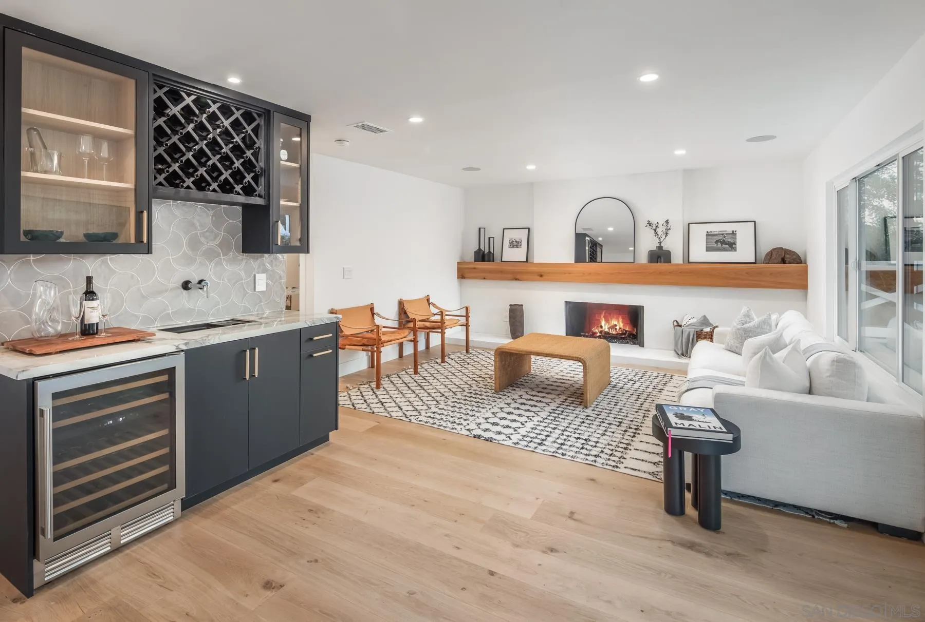 2125 Woodwind Drive Encinitas, CA 92024 - Photo 13 of 33 a living room with furniture and a flat screen tv