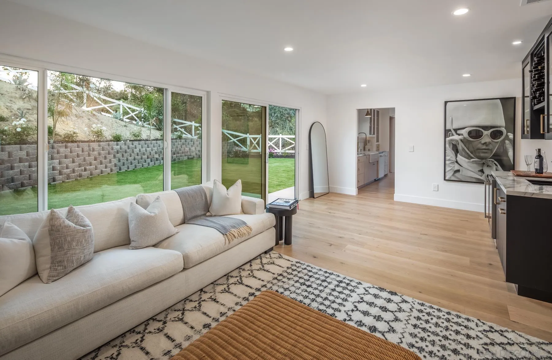 2125 Woodwind Drive Encinitas, CA 92024 - Photo 14 of 33 a living room with furniture and a large window