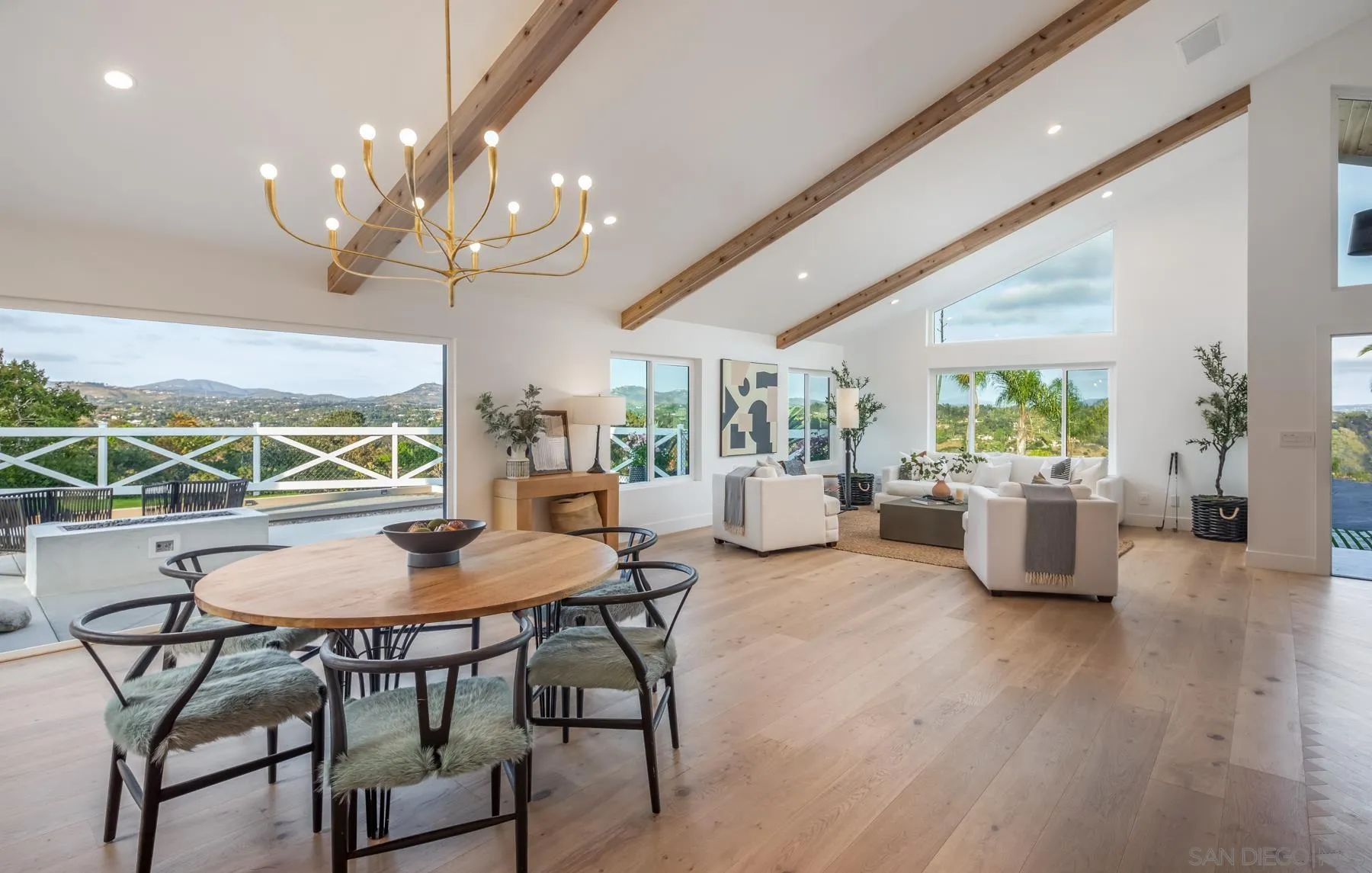 2125 Woodwind Drive Encinitas, CA 92024 - Photo 2 of 33 a view of a dining room with furniture window and wooden floor